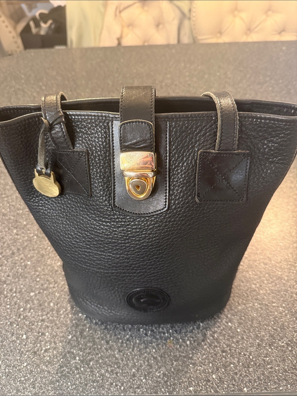 Vintage Dooney & Bourke Black Pebbled Leather BuxketTote with Gold Hardware